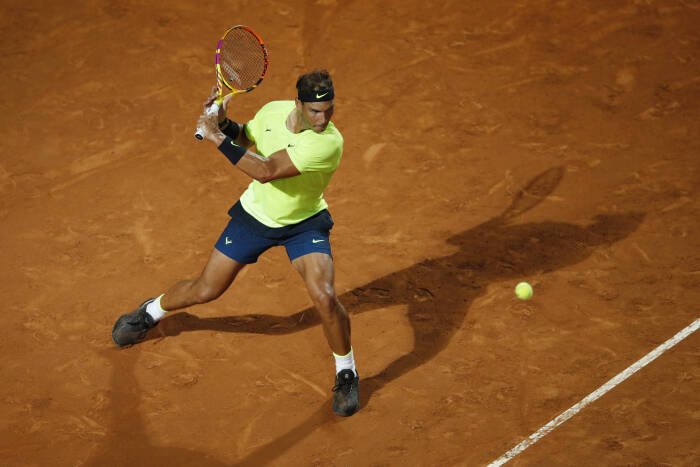 REUTERS/Clive Brunskill Rafael Nadal dari Spanyol beraksi selama pertandingan putaran kedua melawan petenis Spanyol Pablo Carreno-Busta