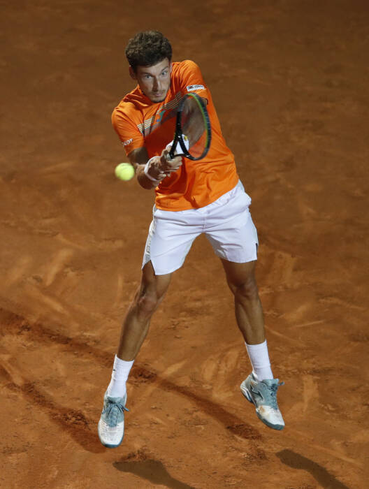 REUTERS/Clive Brunskill Pablo Carreno-Busta dari Spanyol beraksi selama pertandingan putaran kedua melawan petenis Spanyol Rafael Nadal
