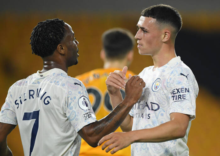 Phil Foden dari Manchester City merayakan gol kedua mereka dengan Raheem Sterling (REUTERS/Stu Forster) Phil Foden dari Manchester City merayakan gol kedua mereka dengan Raheem Sterling