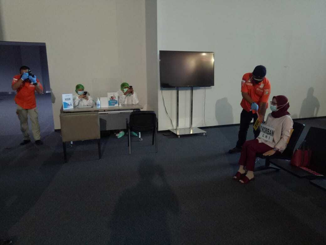 Rekonstruksi pelecehan saat rapid test di Bandara Soetta. (Dok Polres Bandara Soetta) Rekonstruksi pelecehan
