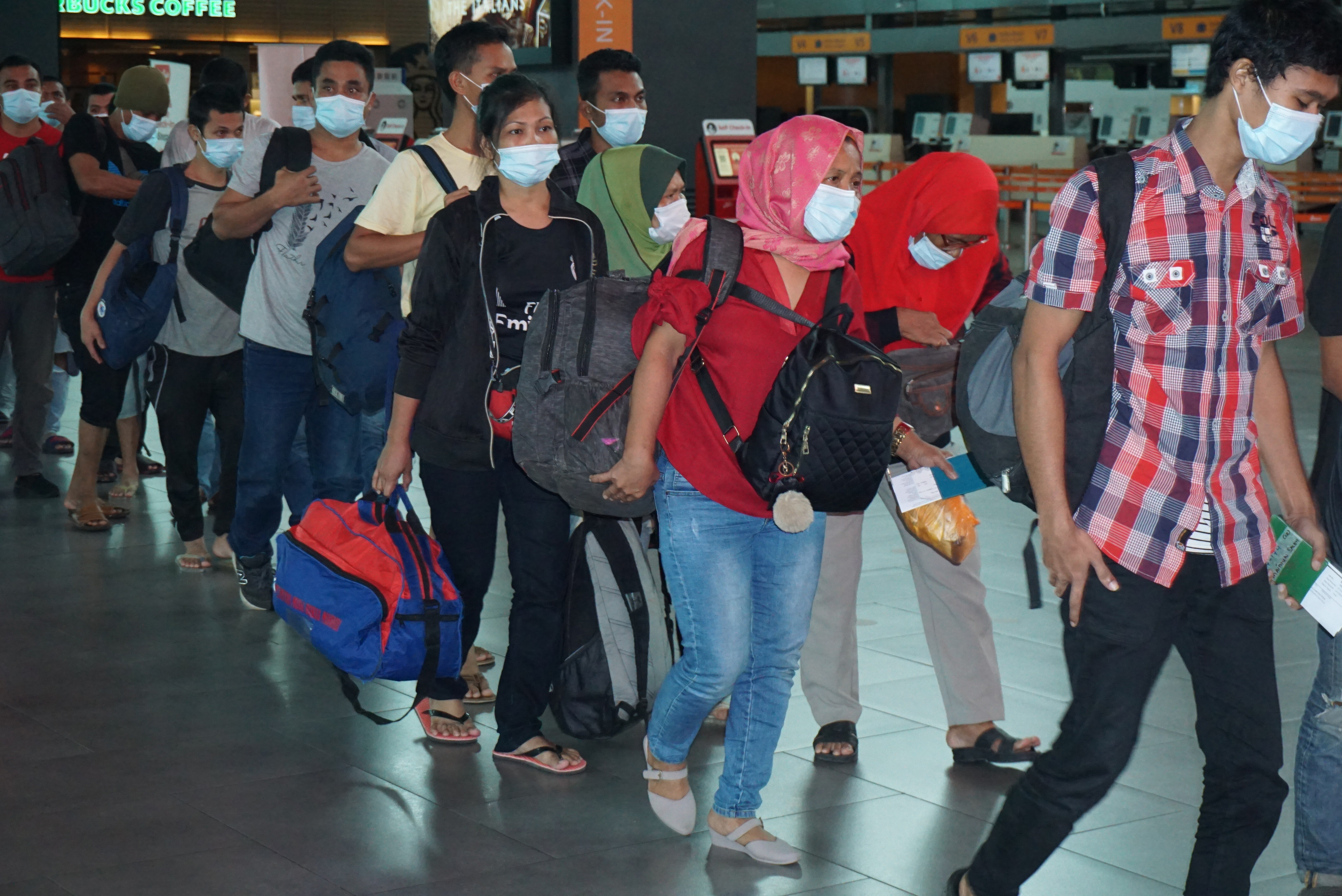 ANTARA FOTO/Agus Setiawan tki ilegal dipulangkan