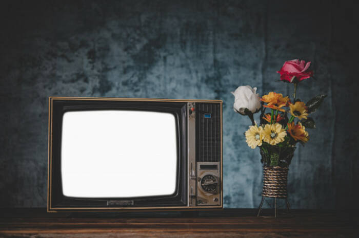 Ilustrasi televisi. (freepik/jcomp) Hari Televisi Sedunia, Ini Perkembangan Tv dari Awal Sampai Sekarang