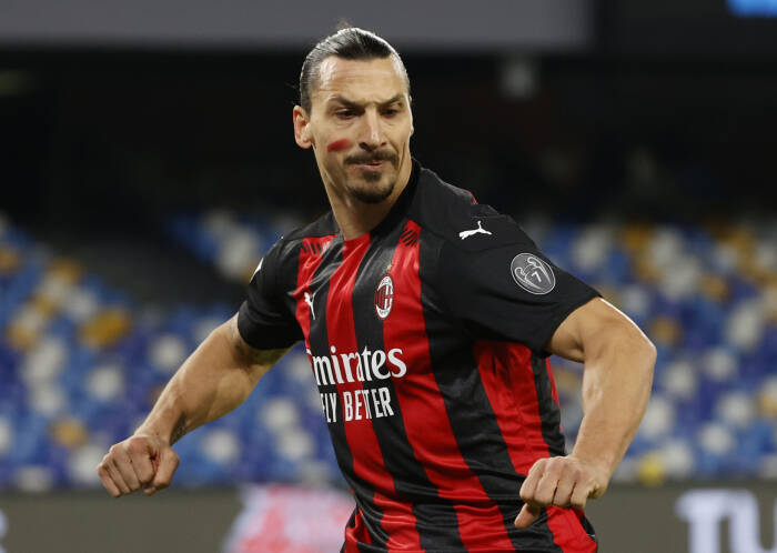 Zlatan Ibrahimovic dari AC Milan merayakan mencetak gol pertama mereka (REUTERS/Ciro De Luca) Zlatan Ibrahimovic dari AC Milan merayakan mencetak gol pertama mereka