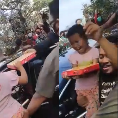 Potongan video seorang ibu dan anaknya diduga tak mengenakan masker saat menerima bingkisan dari Jokowi. / twitter Potongan video seorang ibu dan anaknya diduga tak mengenakan masker saat menerima bingkisan dari Jokowi. / twitter